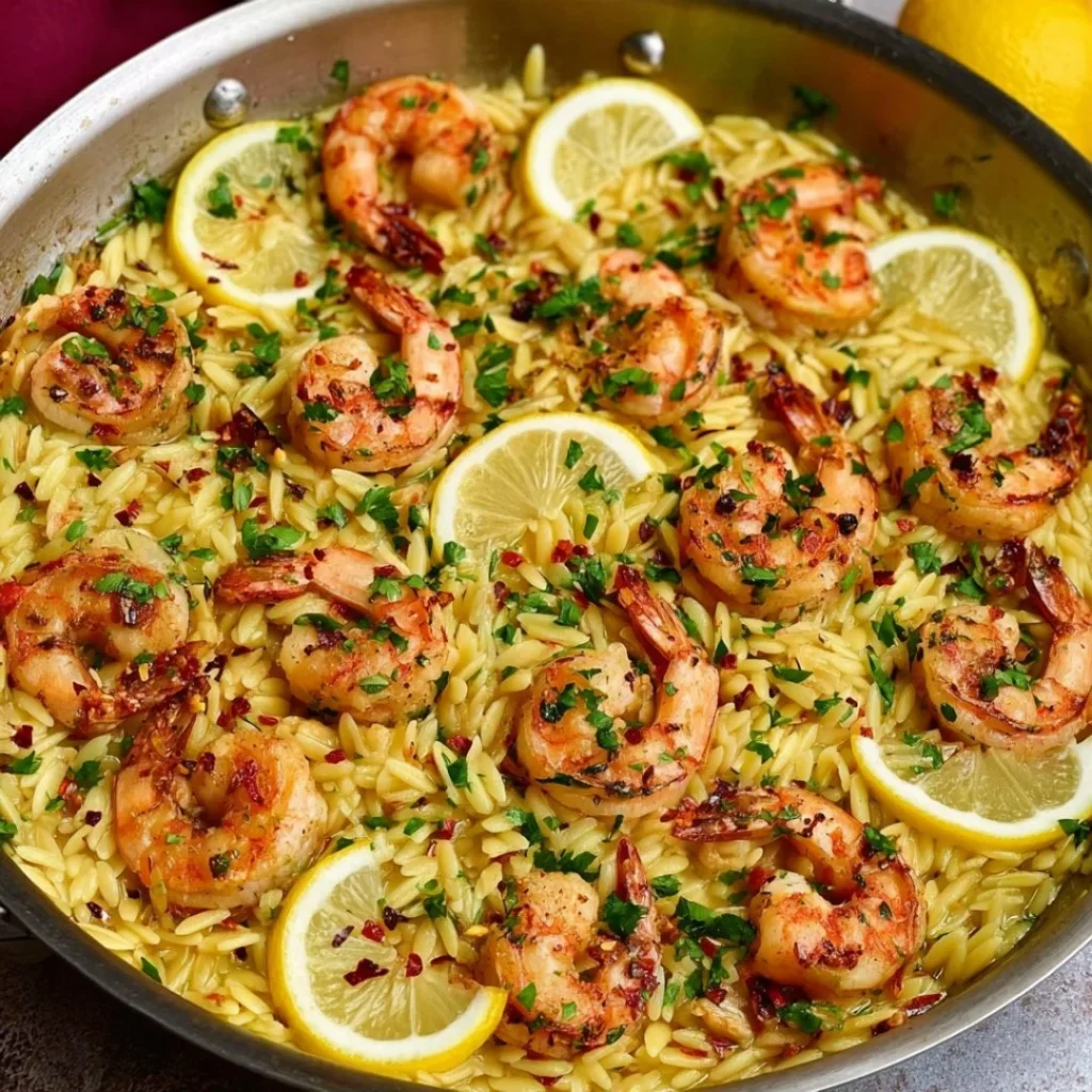 Blue_Salt_Trick_for_Men_Recipe_05 A bright, fizzy blue beverage with granulated salt crystals and a clear jar on a granite surface.