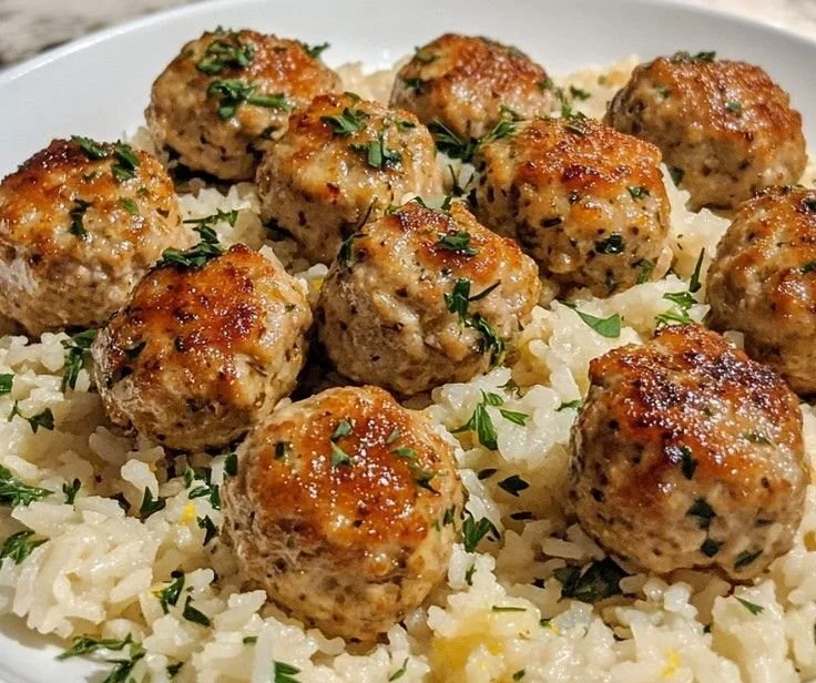 A bright, fizzy blue beverage with granulated salt crystals and a clear jar on a granite surface.
