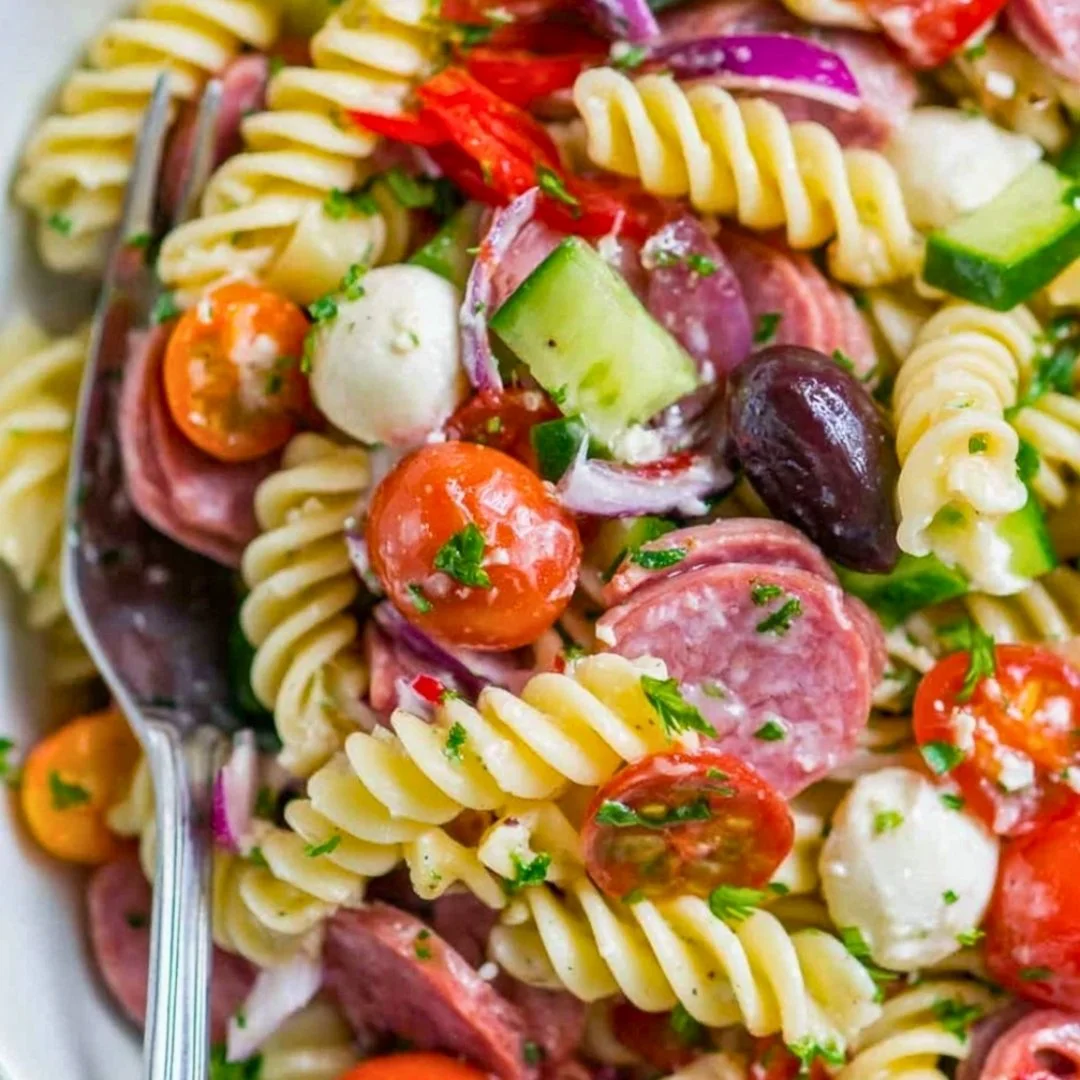 Colorful Italian Pasta Salad with vegetables and dressing
