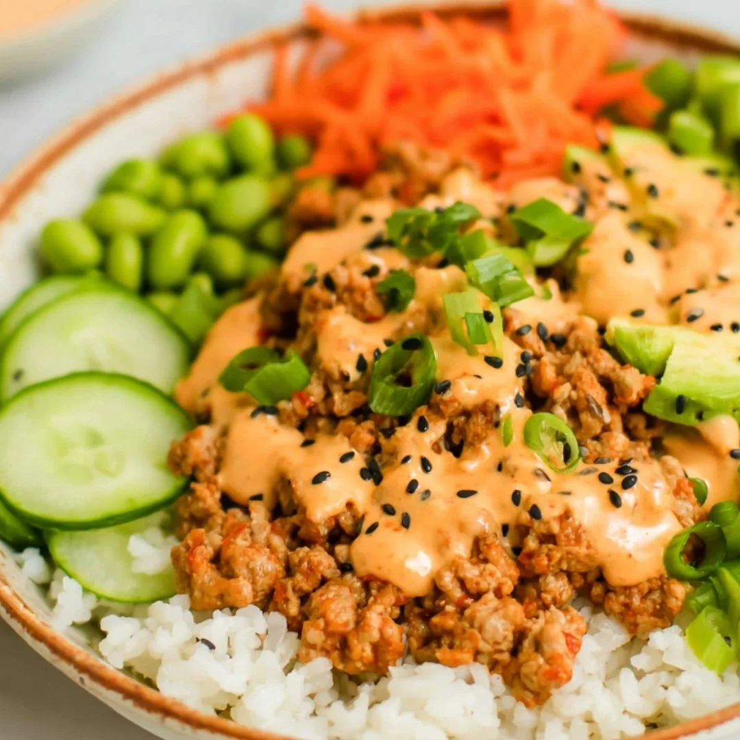 Ground turkey rice bowls with Bang Bang sauce served in a bowl.